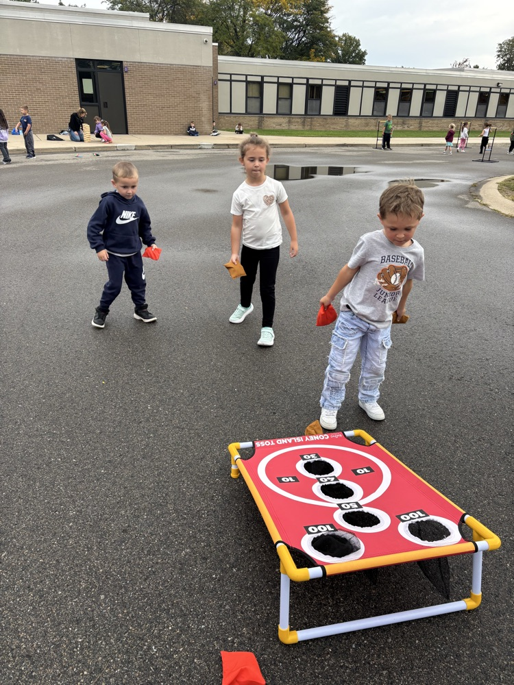 Students enjoying the September PBIS Party by playing outdoor yard games with their classmates.