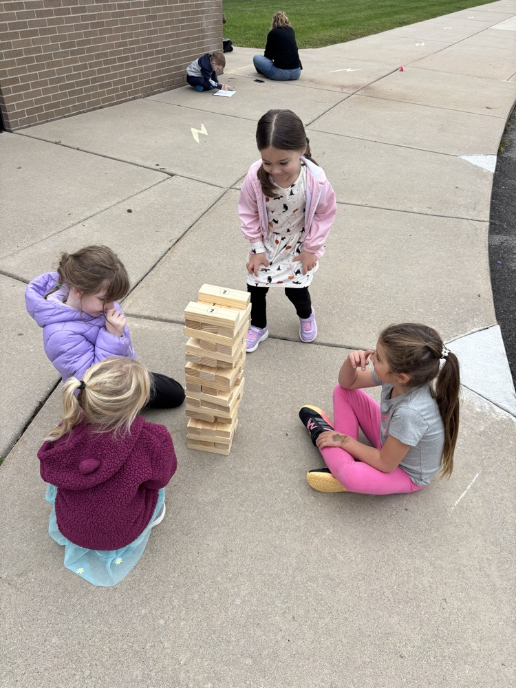 Students enjoying the September PBIS Party by playing outdoor yard games with their classmates.