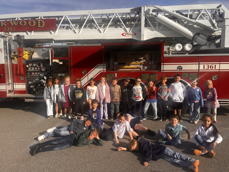 Students getting a closer look at the firefighter equipment.