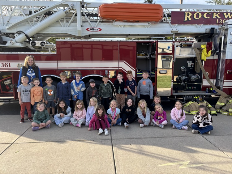 Students getting a closer look at the firefighter equipment.