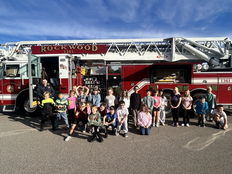 Students getting a closer look at the firefighter equipment.