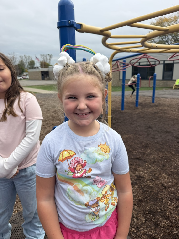 Students showing off their crazy hairstyles and fun socks for Spirit Week.