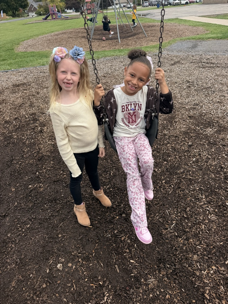 Students showing off their crazy hairstyles and fun socks for Spirit Week.