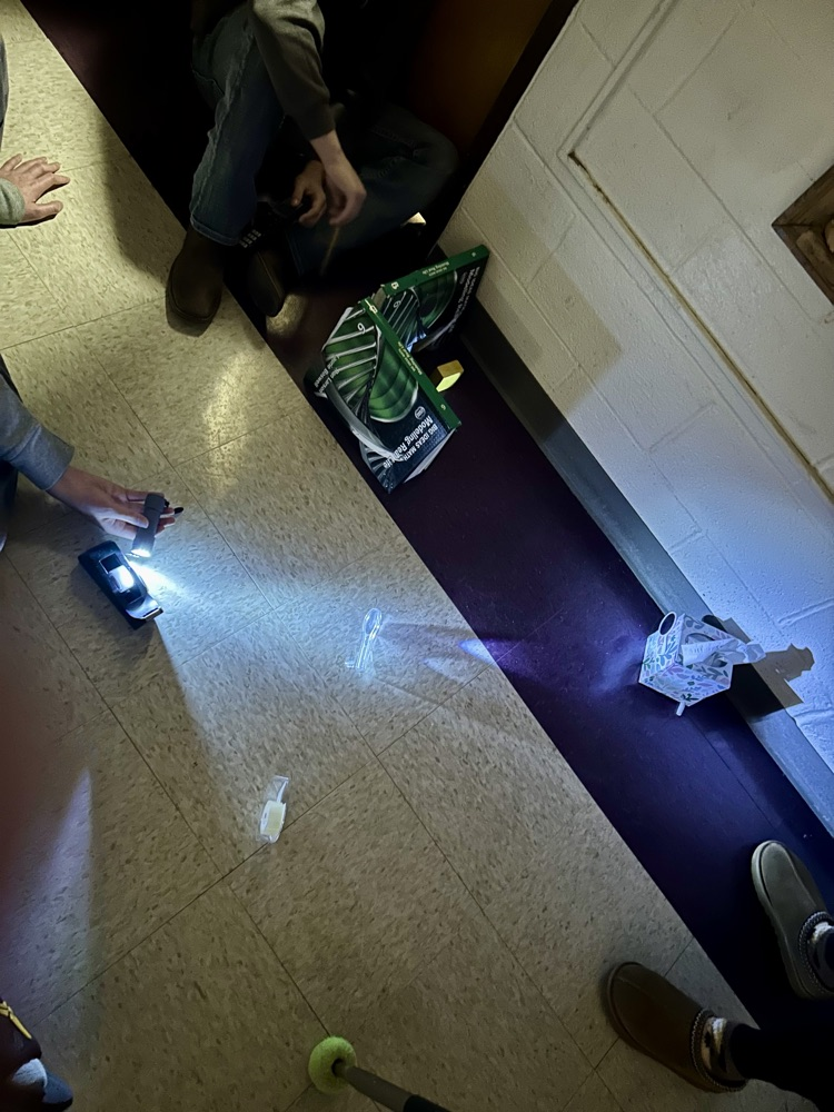 8th grade had to design a security system to protect a gem using the properties of light.