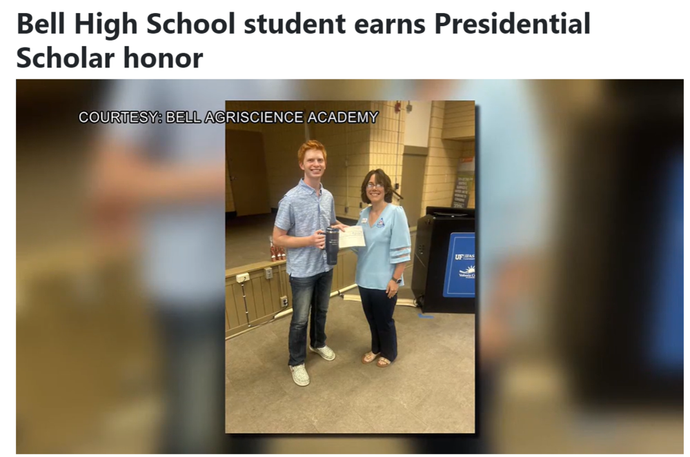 Student receiving award