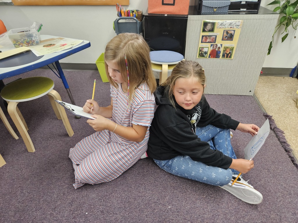 Nori describing a crayon as Willow listens and draws
