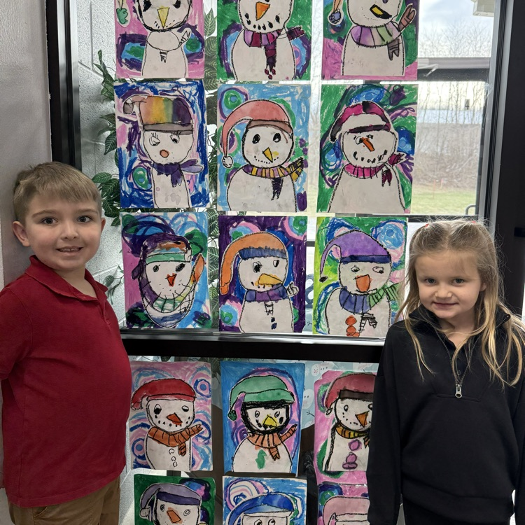 Kindergarten oil pastel and watercolor snowmen with concentric circle backgrounds 