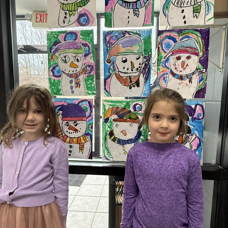 Kindergarten oil pastel and watercolor snowmen with concentric circle backgrounds