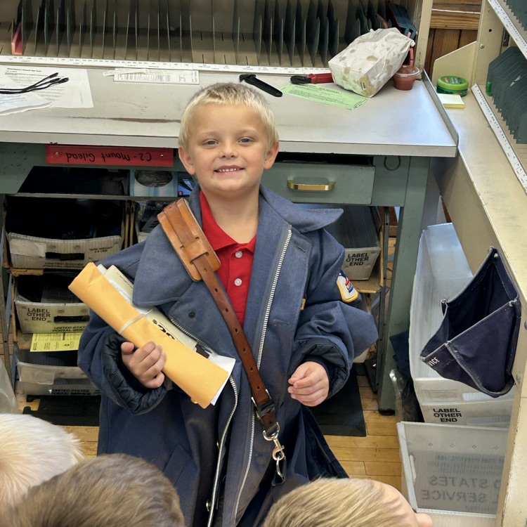 We were able to try on a mail carrier outfit