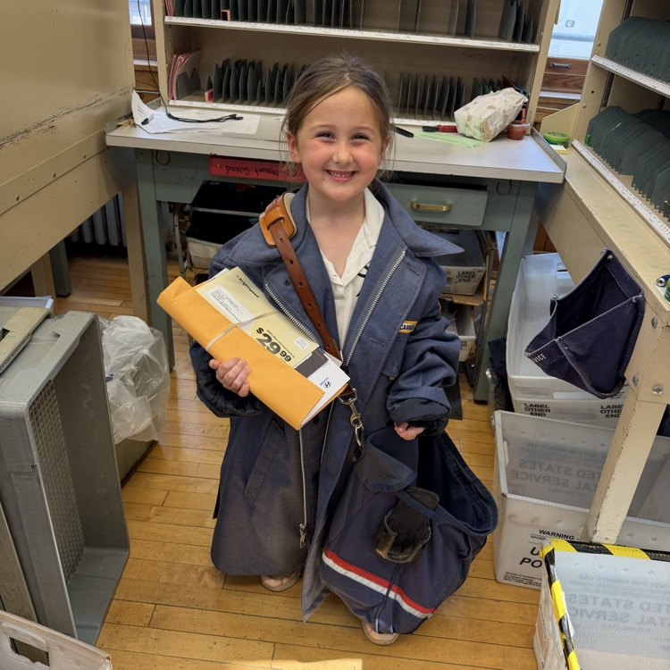 We were able to try on a mail carrier outfit