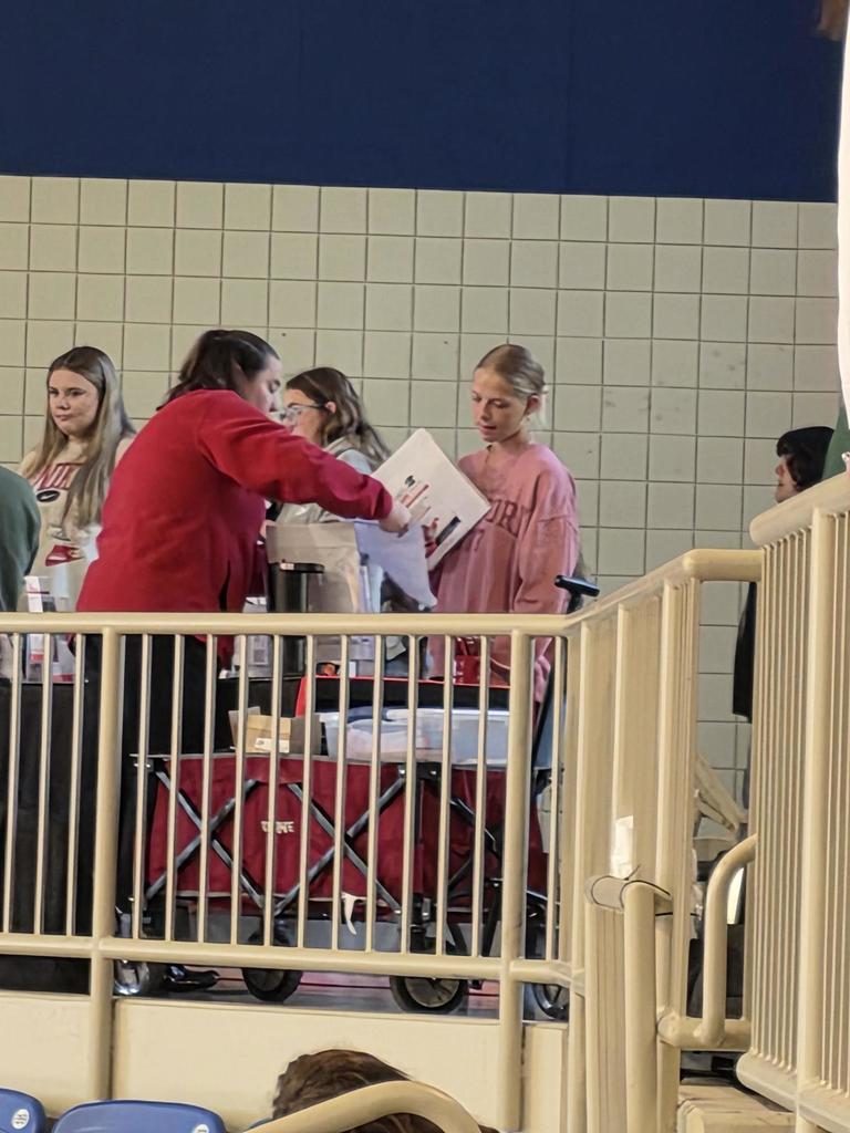 students receiving materials