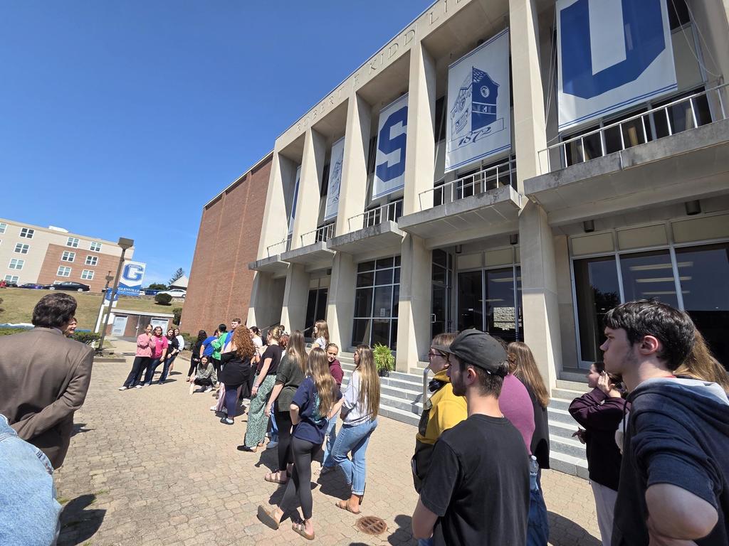 students walking into the building