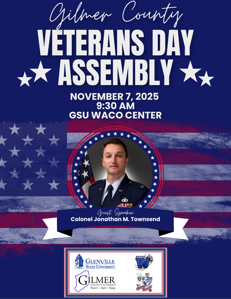 Promotional flyer for the Gilmer County Veterans Day Assembly. The background is dark blue with white stars and red and white stripes. The top text reads “Gilmer County Veterans Day Assembly” in large white letters with stars on each side. Below it states: “November 7, 2025, 9:30 AM, GSU Waco Center.” In the center, there is a circular photo of a man in a military uniform identified as “Guest Speaker Colonel Jonathan M. Townsend.” At the bottom are logos for Glenville State University, Gilmer County Schools, and local schools. The design uses patriotic red, white, and blue colors.