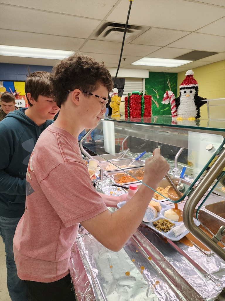 student serving himself