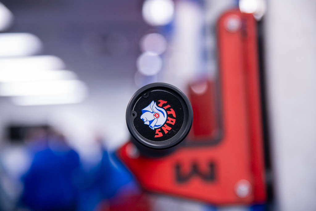 end piece with gilmer county logo on bar