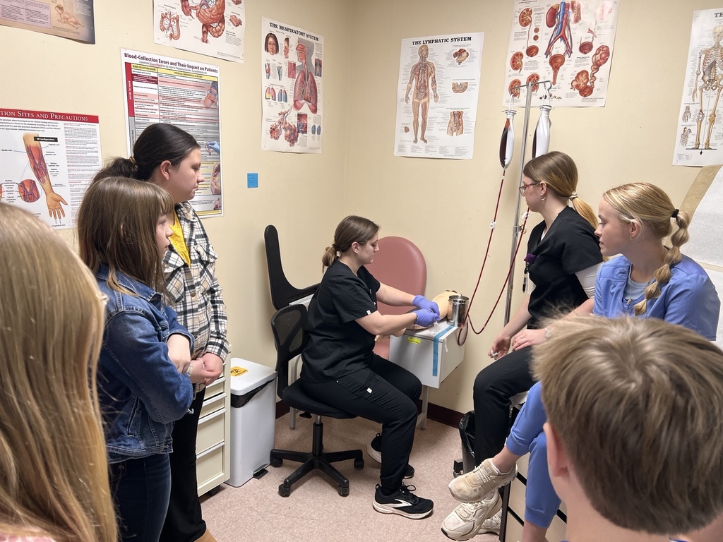 students learning about the medical professions -- blood draws