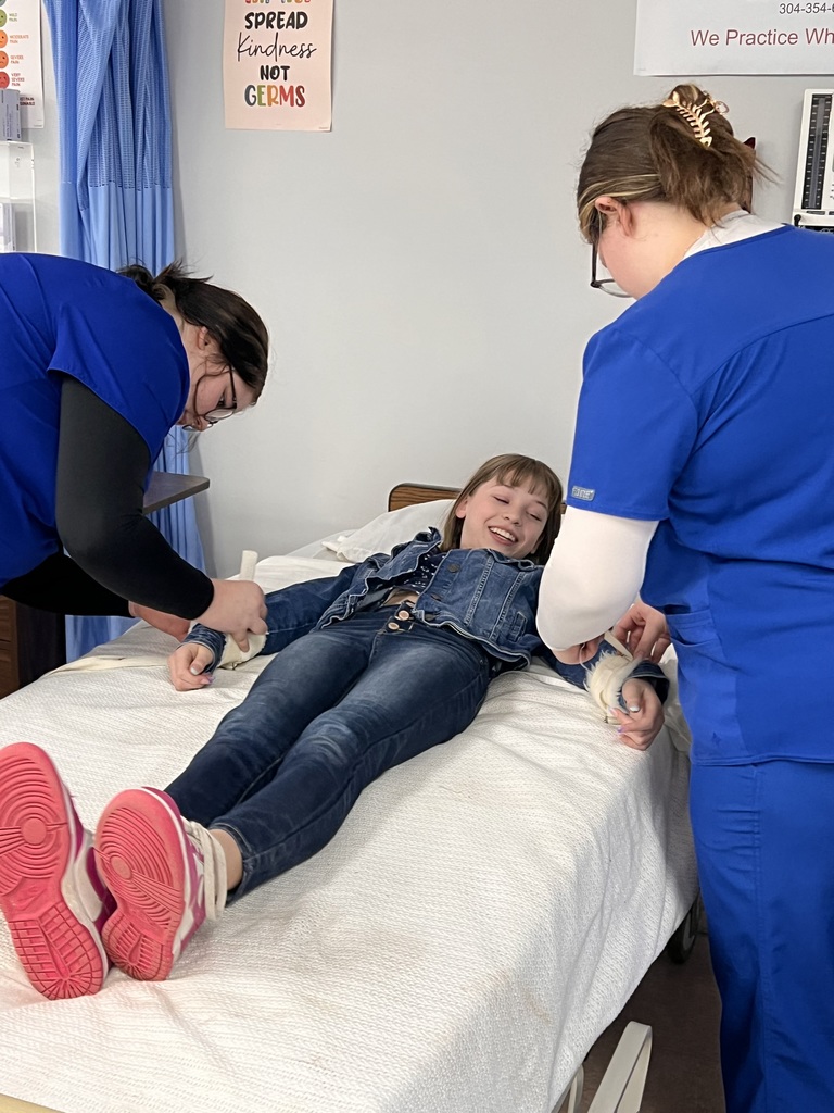 two CGCC students demonstrating a medical procedure