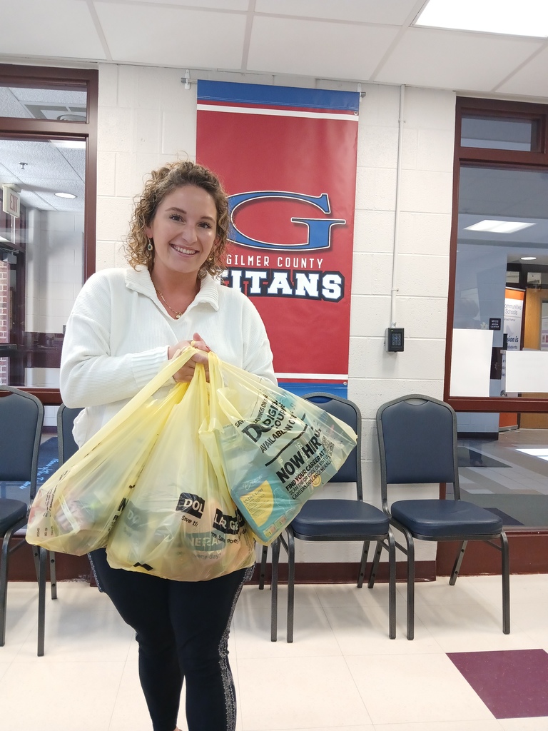 Miss. Garrett with Donation of Goods  for the Titan CLoset 