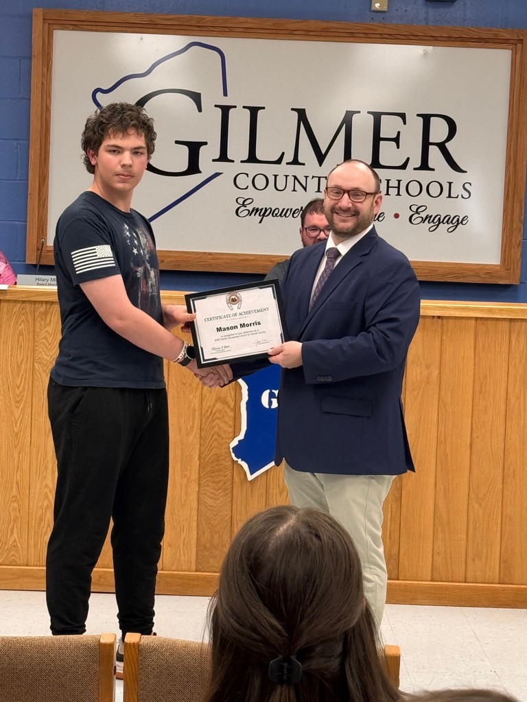 Winner Morris with superintendent