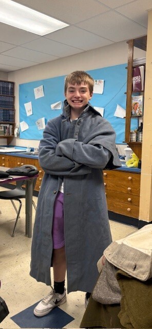 a student with a civil war jacket on