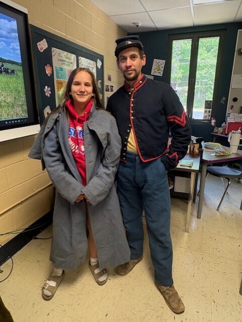 Mr. Barker and a student in civil war attire