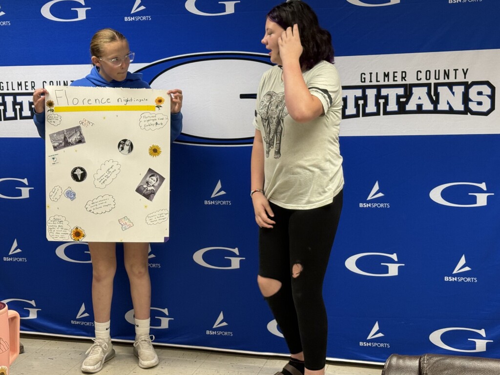 students with a poster about florence nightengale