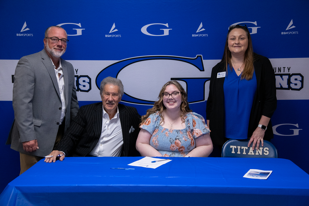 K. minigh with dr. mark manchin and other representatives from GSU