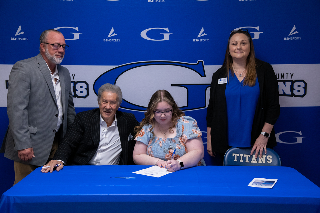 K. minigh with dr. mark manchin and other representatives from GSU