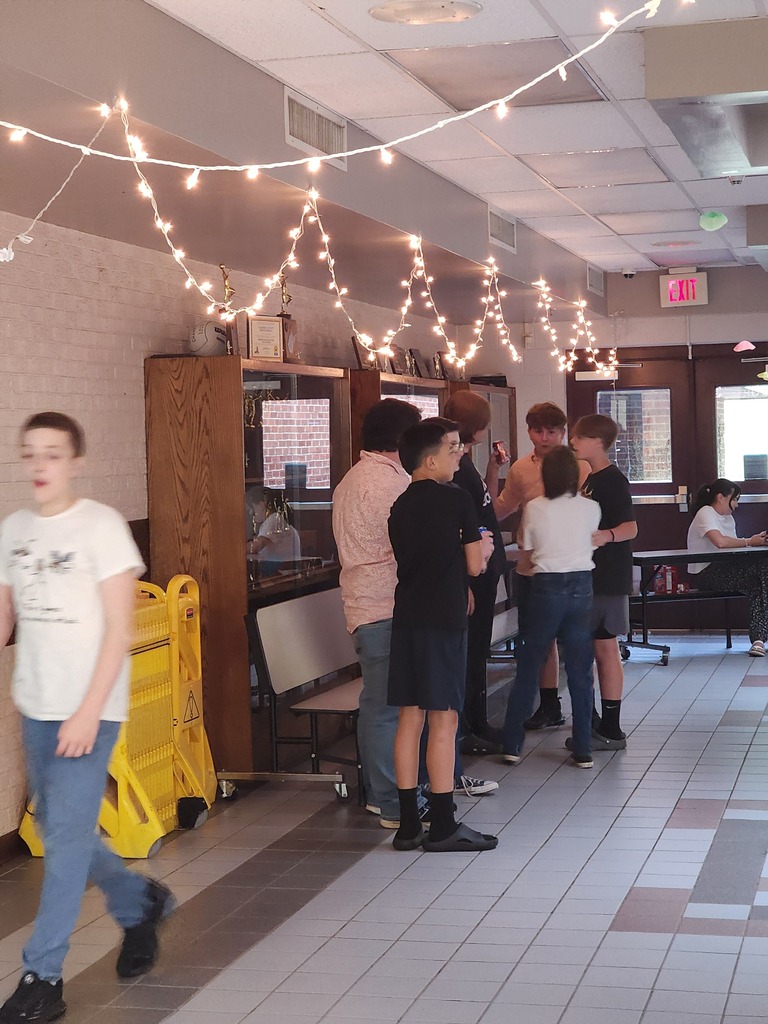 students standing on the dance floor