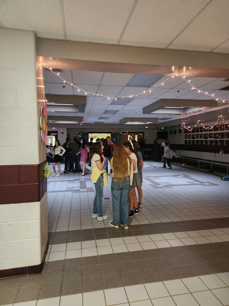 students standing on the dance floor