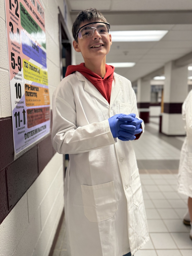 student in a lab coat
