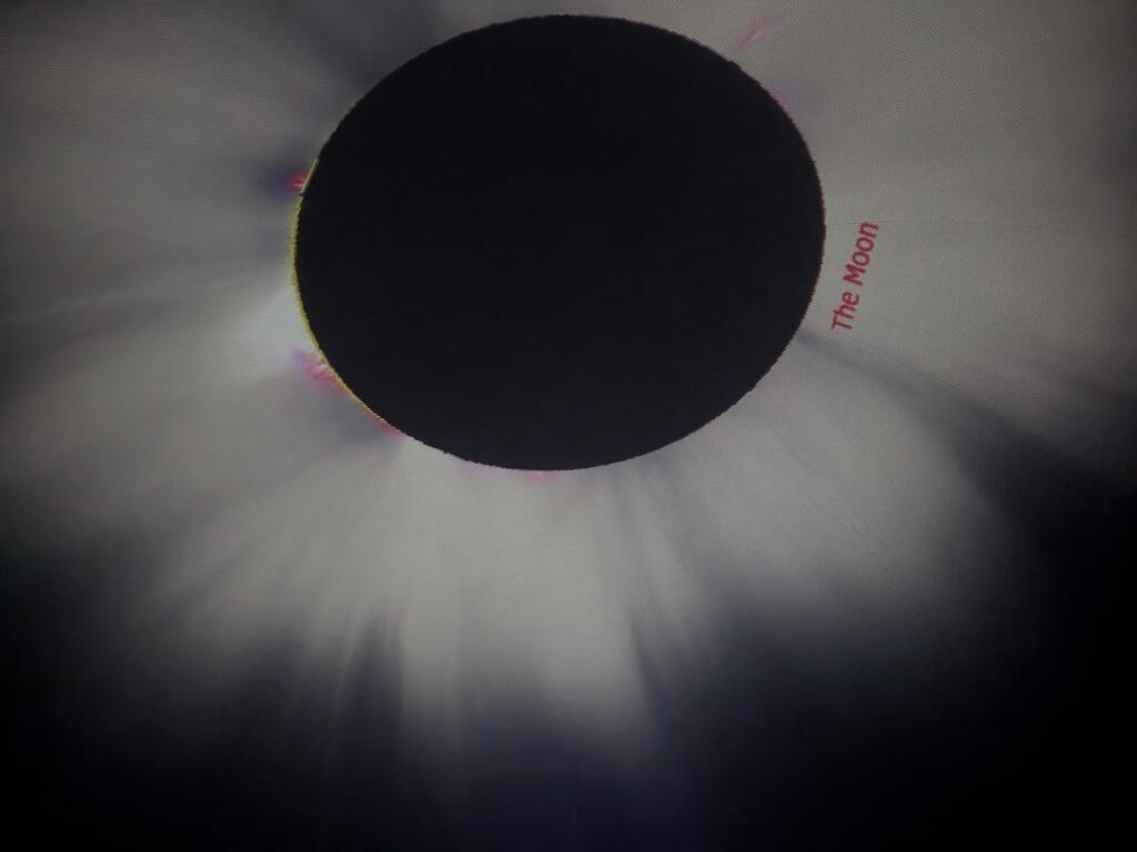 photo of the top of the starlab that shows the moon