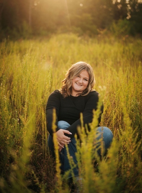 photo of Anna Mason in a wheat field