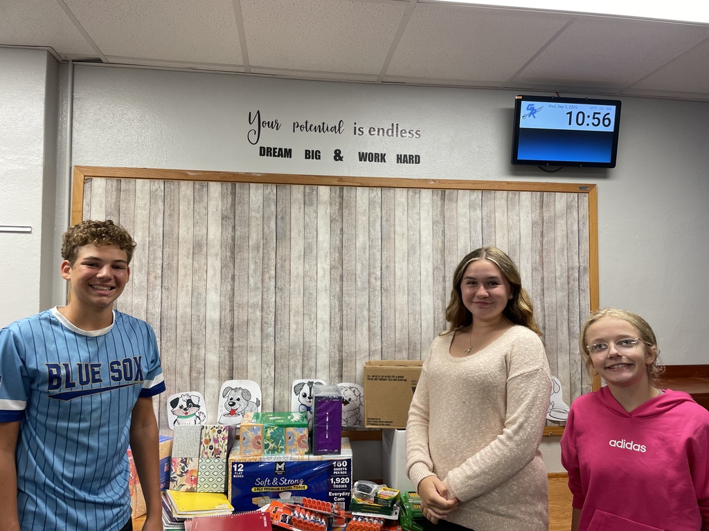 Students with school supplies