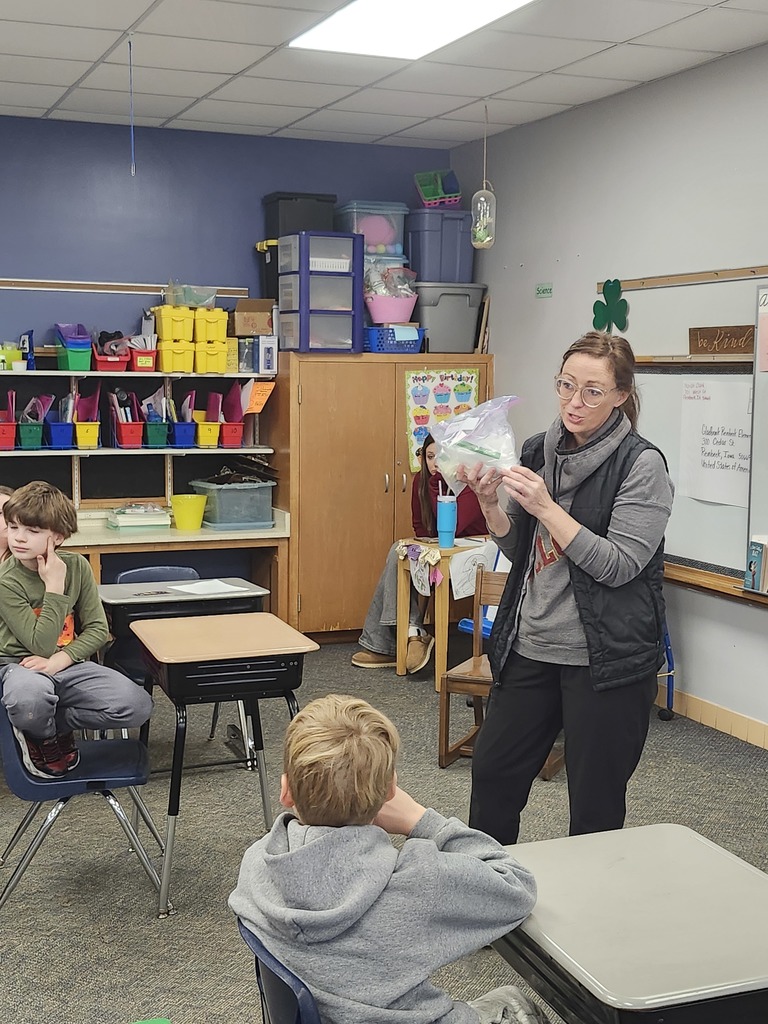 Getting our instructions for ice cream in a bag.