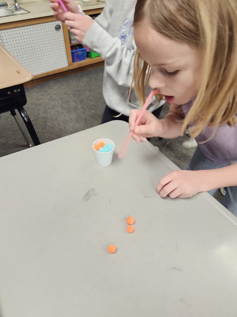 Pretending to be a bee collecting nectar and pollen.