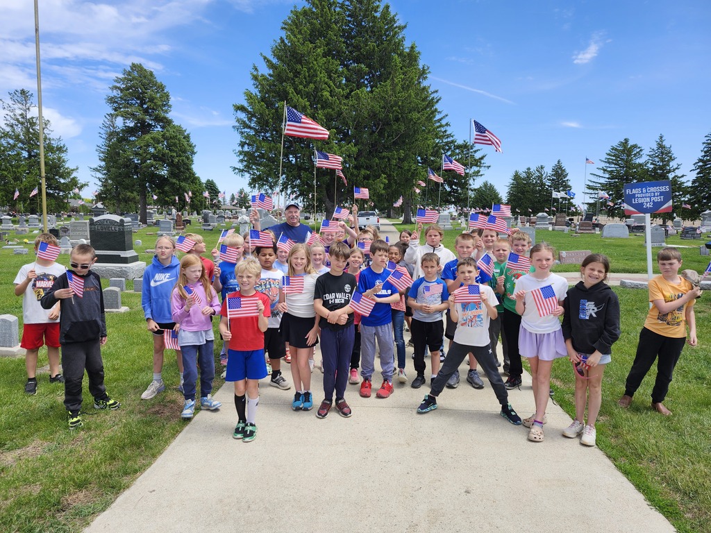 Third grade students with Marshall.