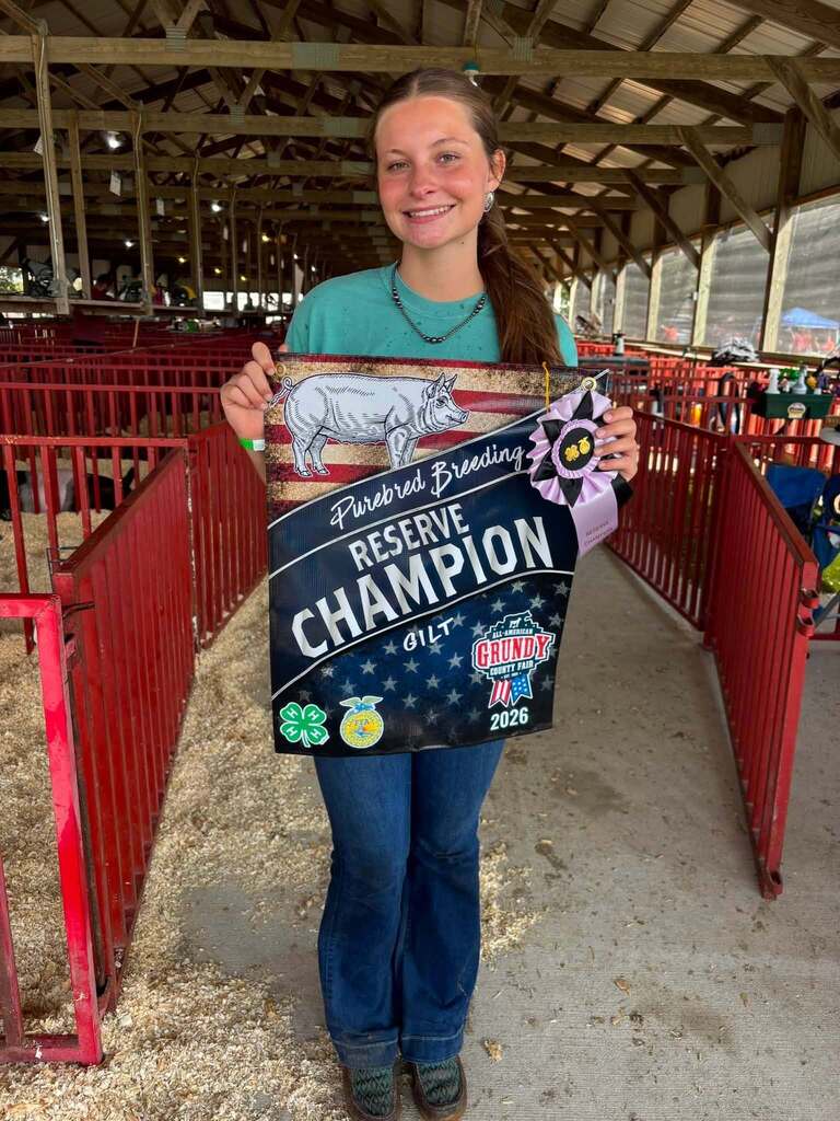 Kinzee and her banner