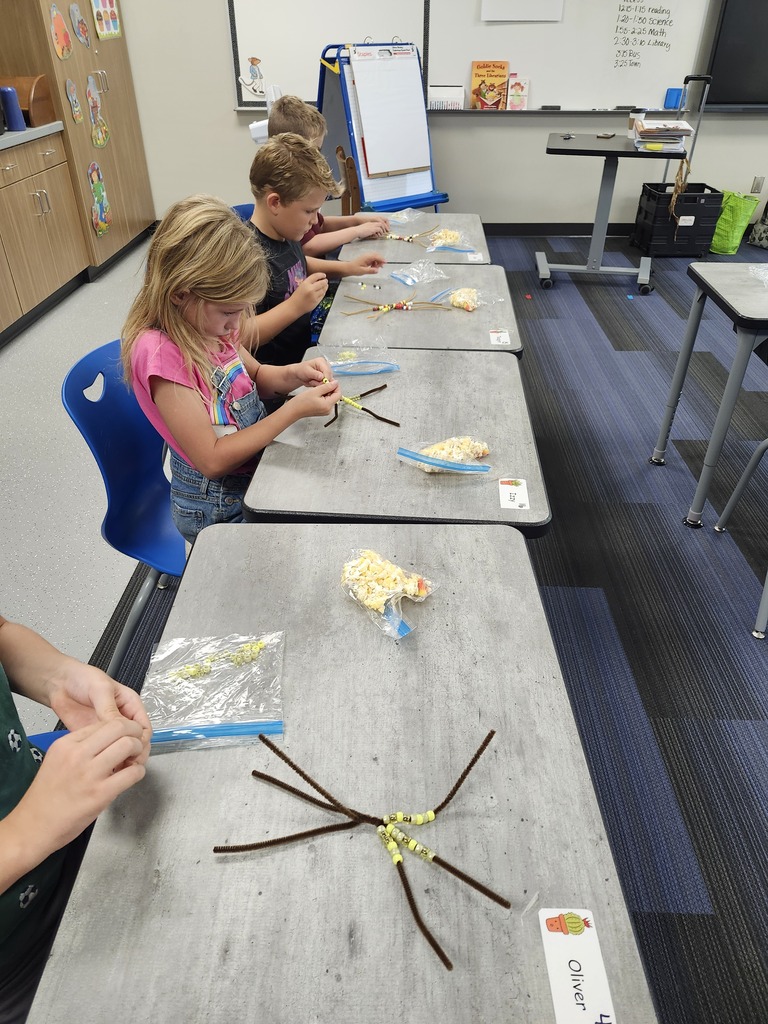 Making our craft and enjoying our snack.