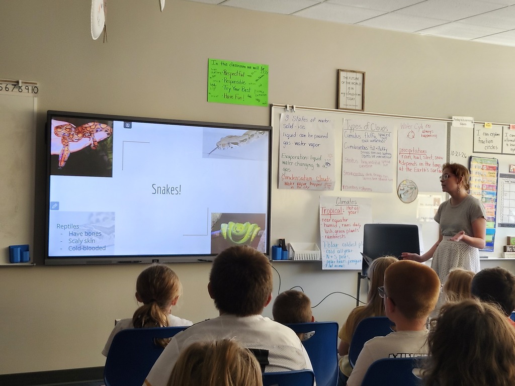 It is fun to learn about reptiles from someone in our building!