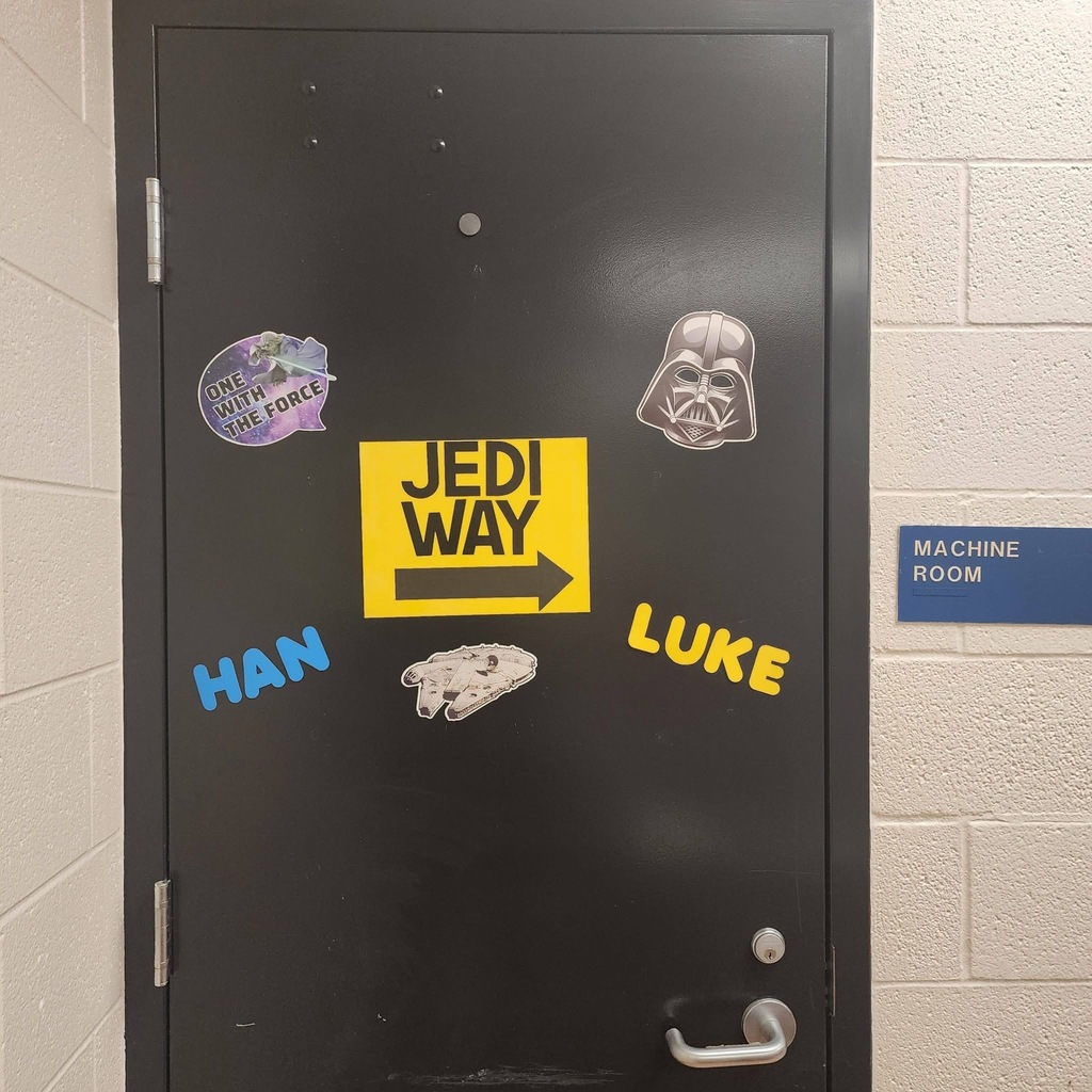 Jedi Way arrow pointing right. Han and Luke. One with the force door decorations
