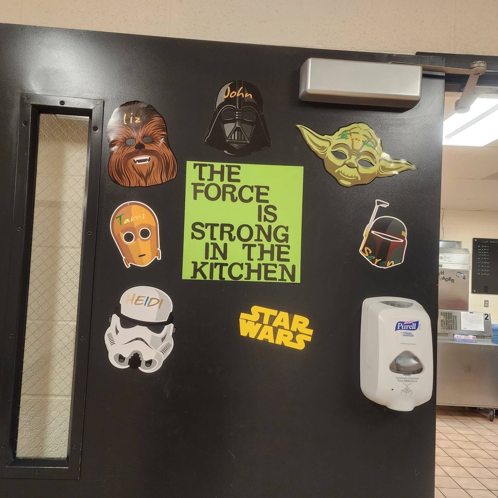 The force is strong in the kitchen. Star Wars decorations on the door. 