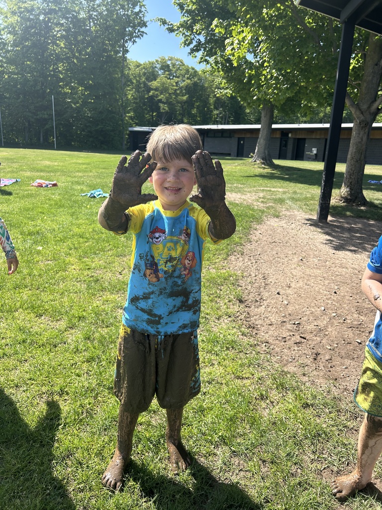 This preschooler had a whole lot of fun with the water and dirt!