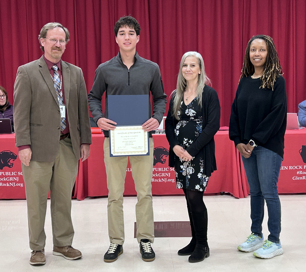 Jay Kreibich Salutatorian with Superintendent, principal, and BOE President
