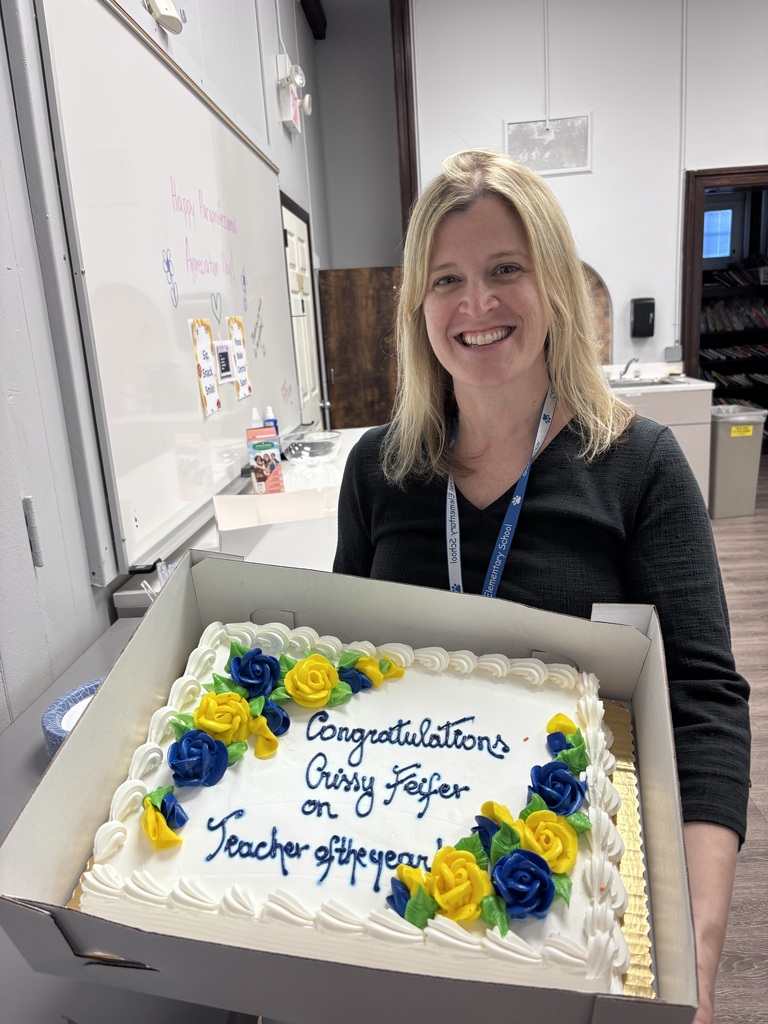 Chrissy Feifer ToY holding cake