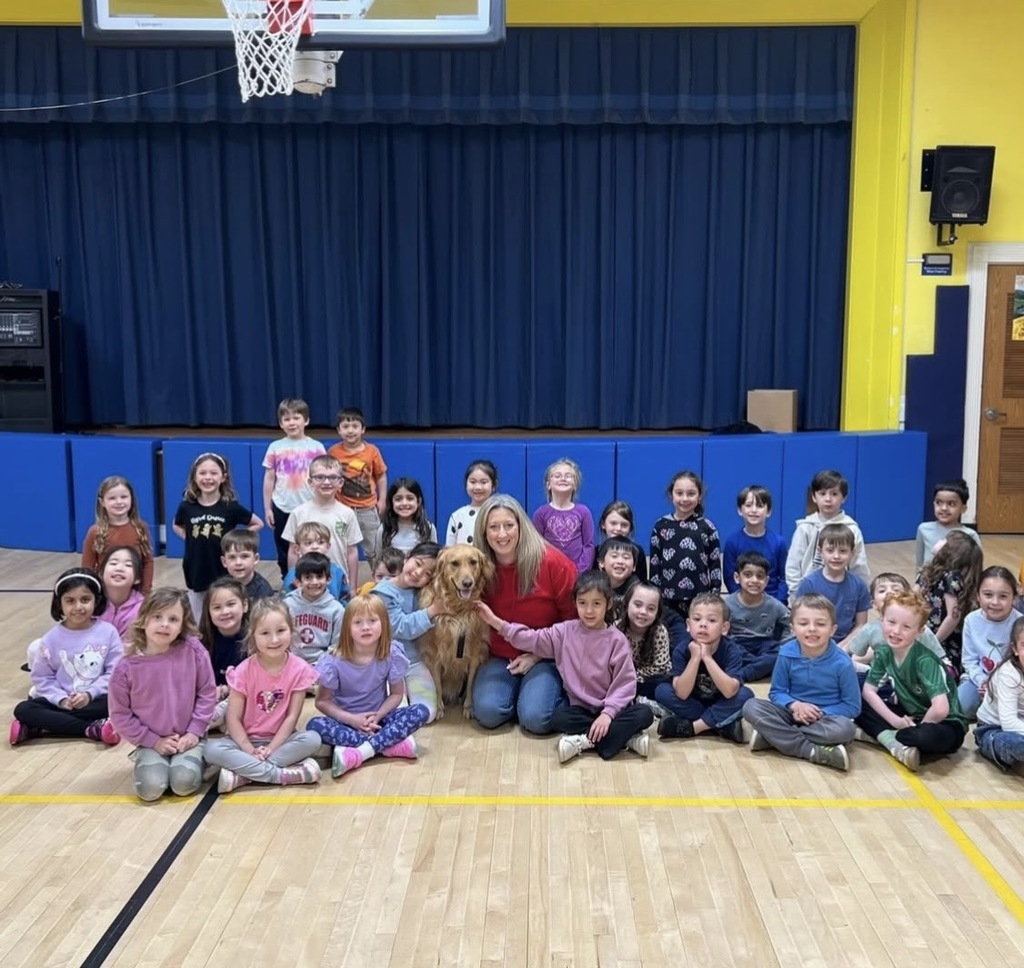 Stella the therapy dog with Byrd students