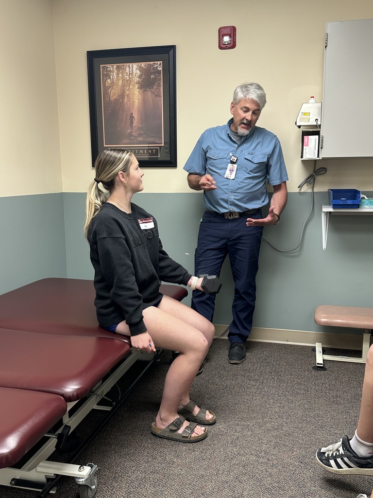 Students visiting with GMC employees