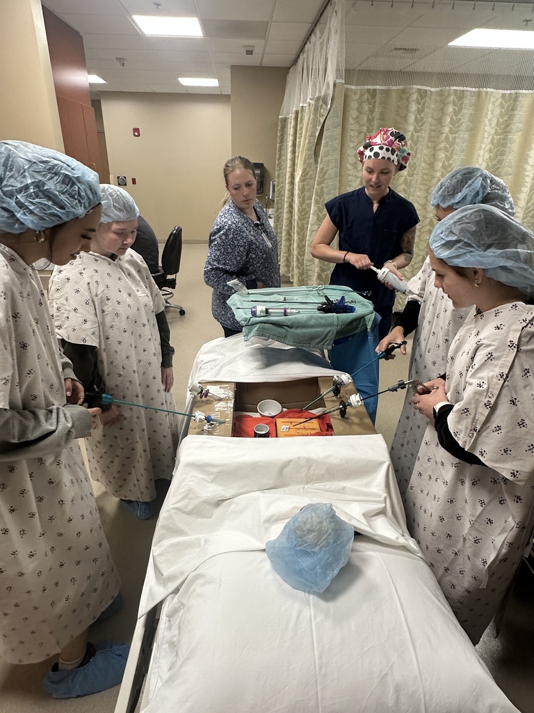 Students visiting with GMC employees