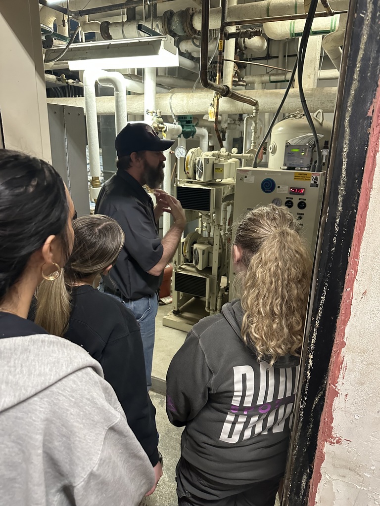 Students visiting with GMC employees