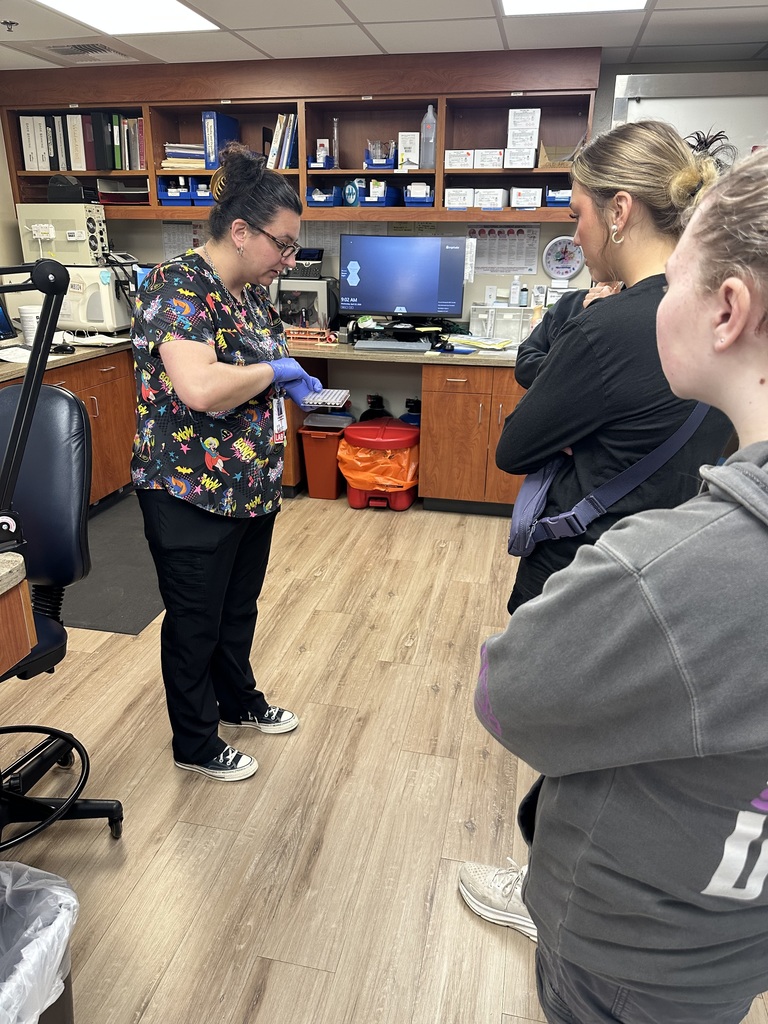 Students visiting with GMC employees